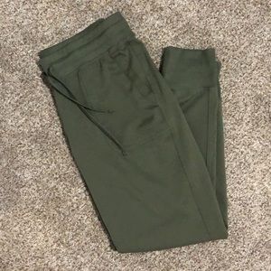 Green athletic joggers